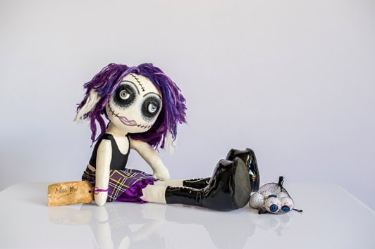 Miss Vivi with bottle of bits and bag of eyes from Dissection Connection